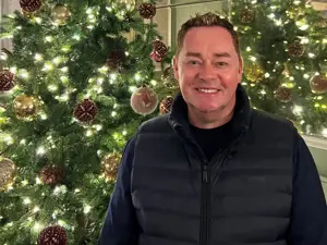 Neven Maguire holding a plate of Christmas food