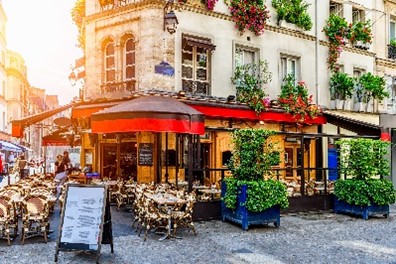 A cafe on a sunny street corner