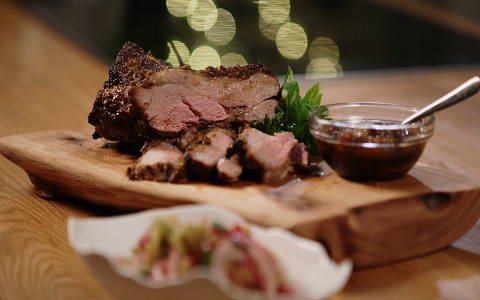 Neven's Aromatic Crusted Butterflied Lamb with Caramelized Garlic and Orange Salsa