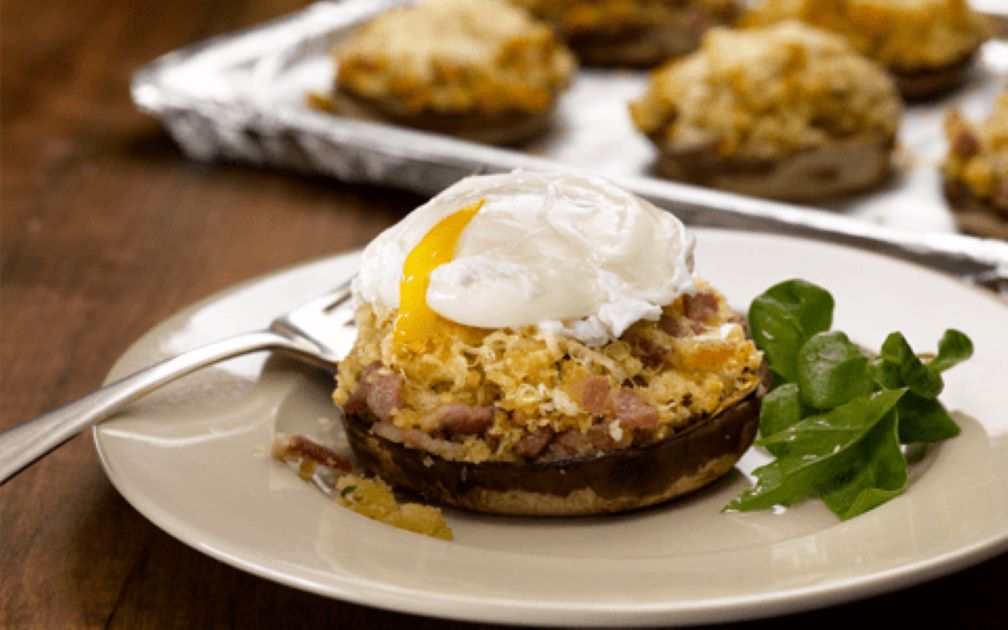 Baked Stuffed Flat Mushrooms Topped with a Poached Egg and Cheese