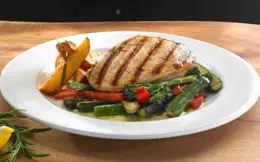 Grilled Chicken with Potato Wedges and Stir-Fry Vegetables