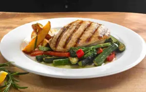 Grilled Chicken with Potato Wedges and Stir-Fry Vegetables