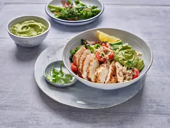 Warm Cajun Chicken Bowl with Rice and Avocado Dressing