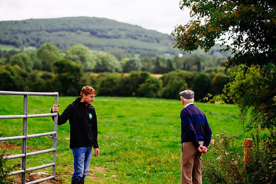 Two farmers at a field