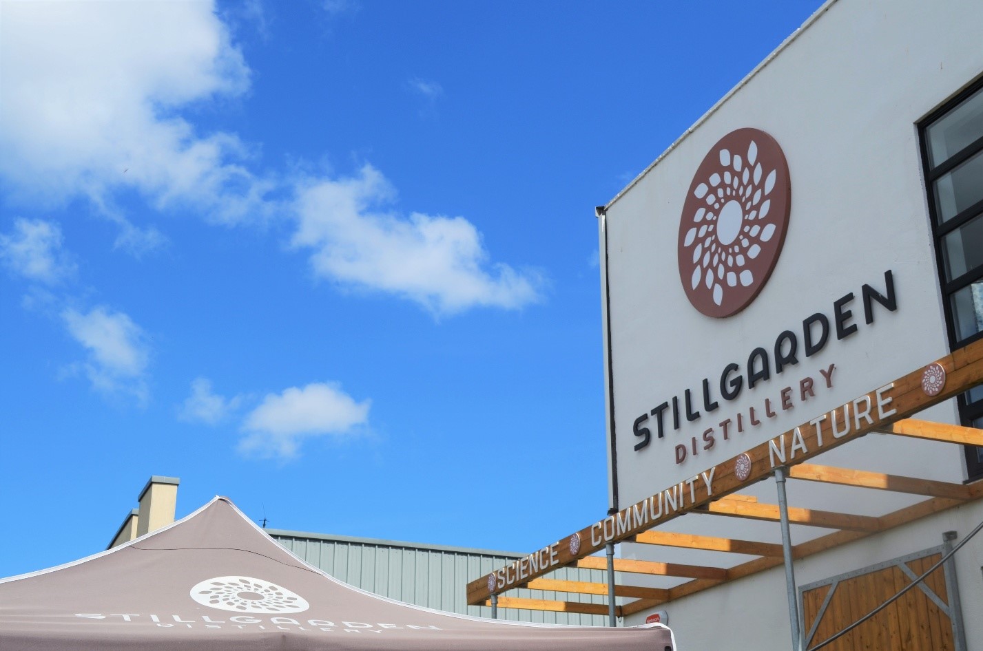 Stillgarden Distillery premises, blue sky in the background